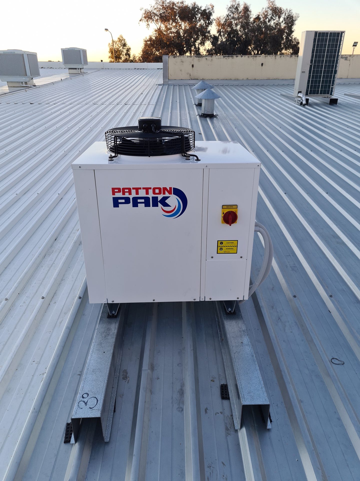 Patton Pak commercial refrigeration condensing unit on corrugated rooftop